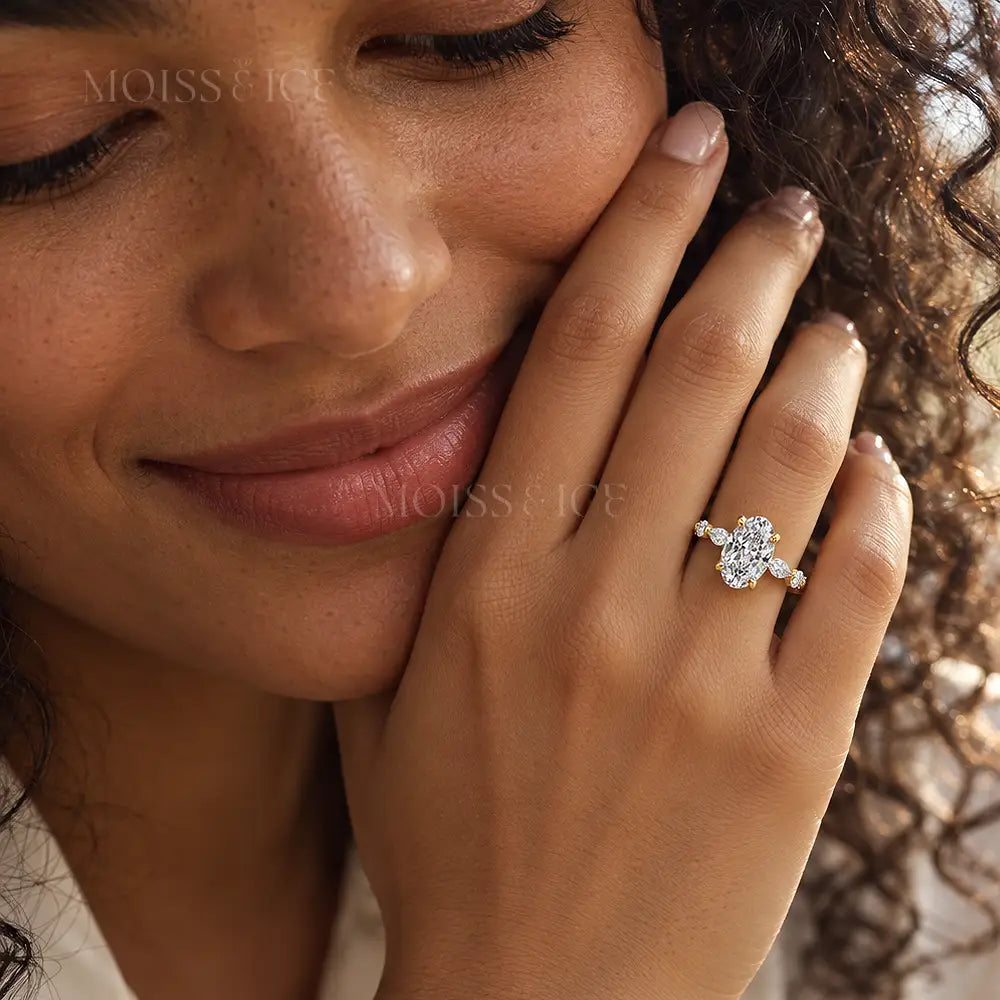happy woman wearing oval cut lab-grown diamond engagement ring by Moiss & Ice Canada