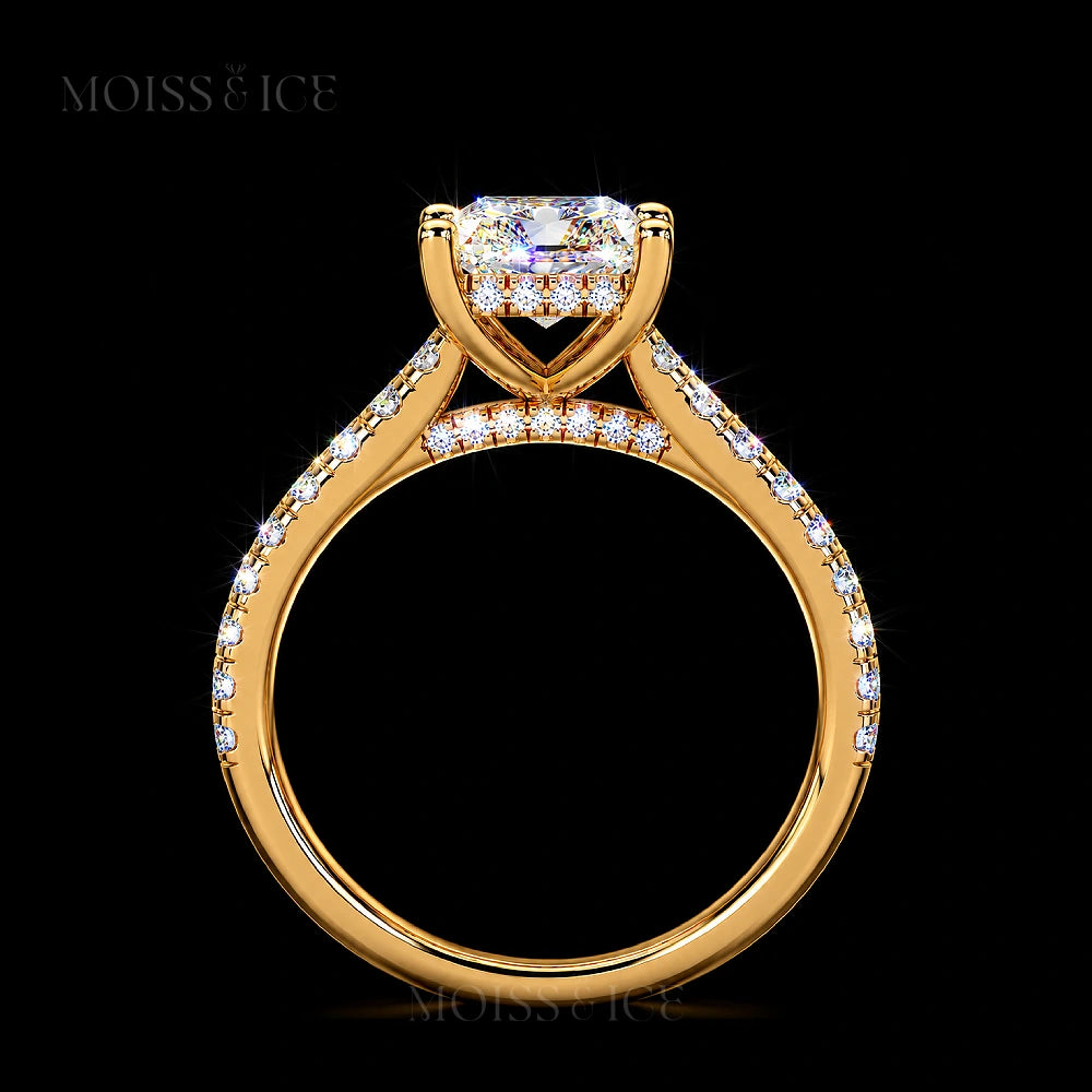 Front view of the Radiant cut Gold Moissanite Engagement Ring with a hidden halo, diamond bridge and Pave band. The Aavya Moiss and Ice Canada
