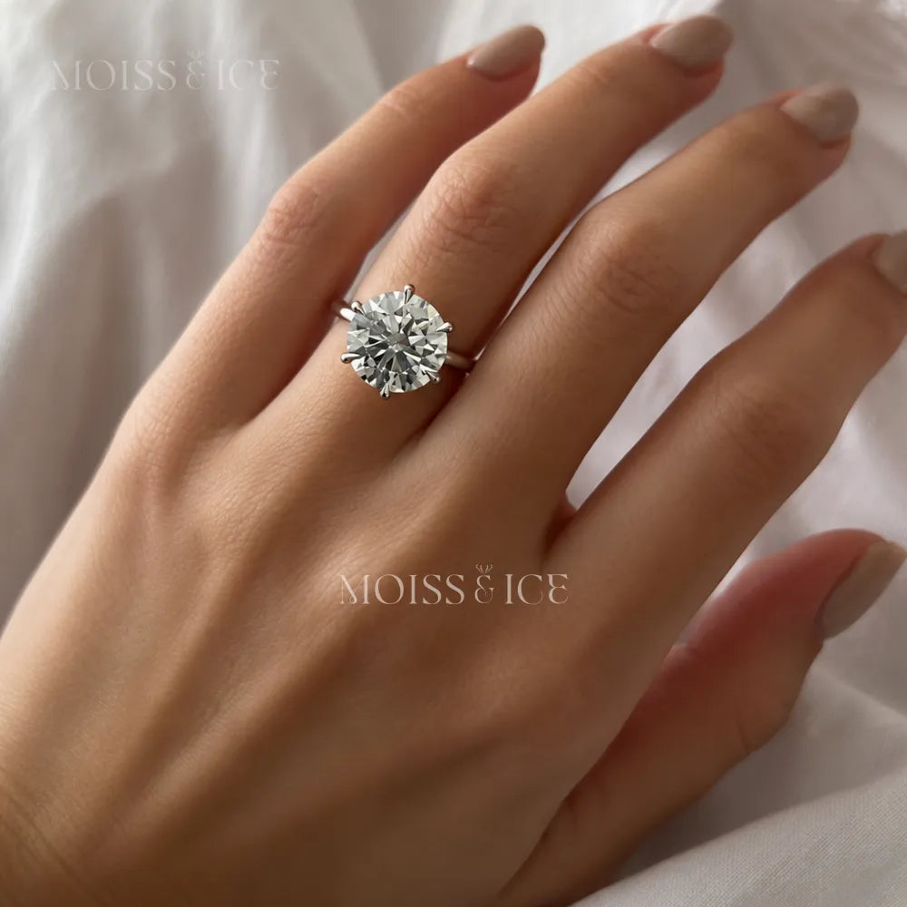 close of hand wearing a large lab-grown diamond showing how you can get a larger real diamond. Moiss and Ice Canada