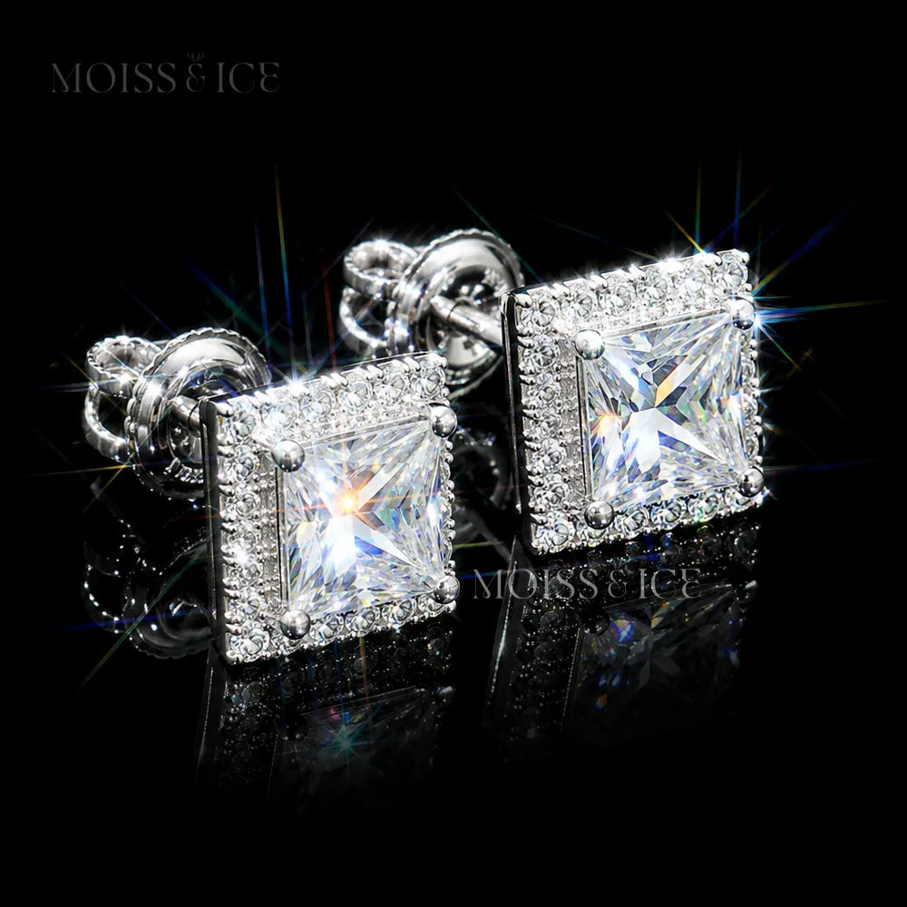 A pair of square princess-cut stud earrings featuring a large moissanite princess-cut center stone surrounded by a halo of small clear pavé moissanite stones, set in 925 silver and finished in 18k white gold by Moiss and Ice Canada