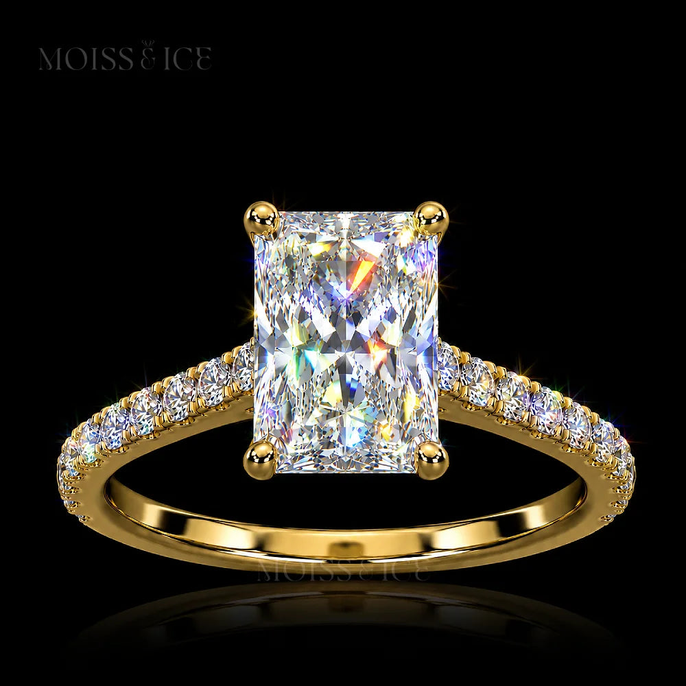 Radiant cut Gold Moissanite Engagement Ring with a hidden halo, diamond bridge and Pave band. The Aavya Moiss and Ice Canada