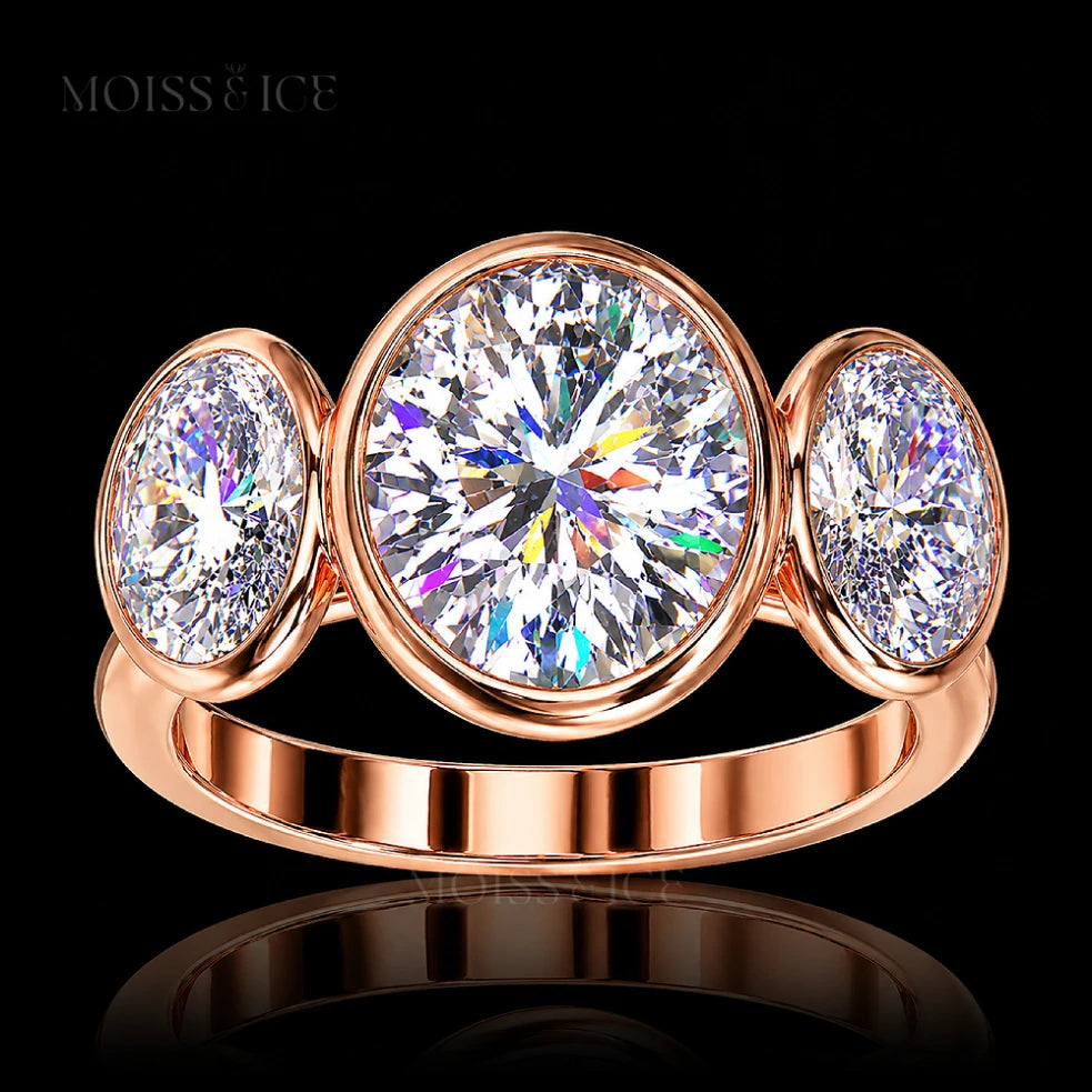 Rose Gold Oval 3 Stone Trilogy Moissanite Engagement Ring called the KAHANI by Moiss & Ice Canada