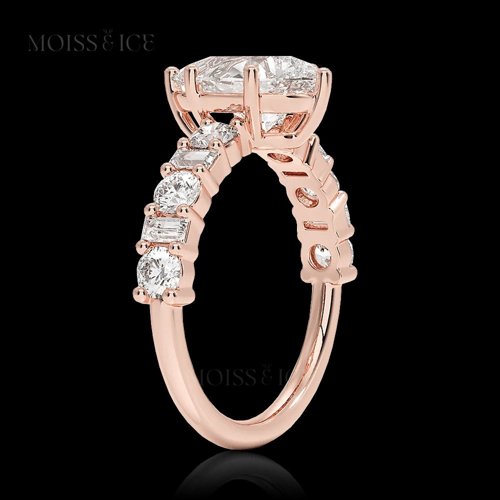 pear cut moissanite engagement ring with a pavé band of alternating baguette and round cut moissanite stones in Silver or 14k and 18k gold - The Chahat by Moiss and Ice Canada