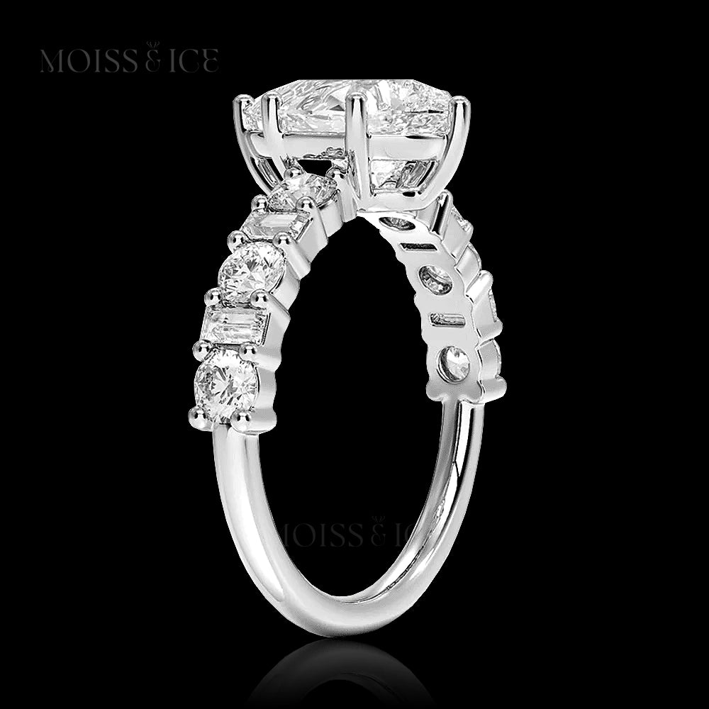 pear cut moissanite engagement ring with a pavé band of alternating baguette and round cut moissanite stones in Silver or 14k and 18k gold - The Chahat by Moiss and Ice Canada