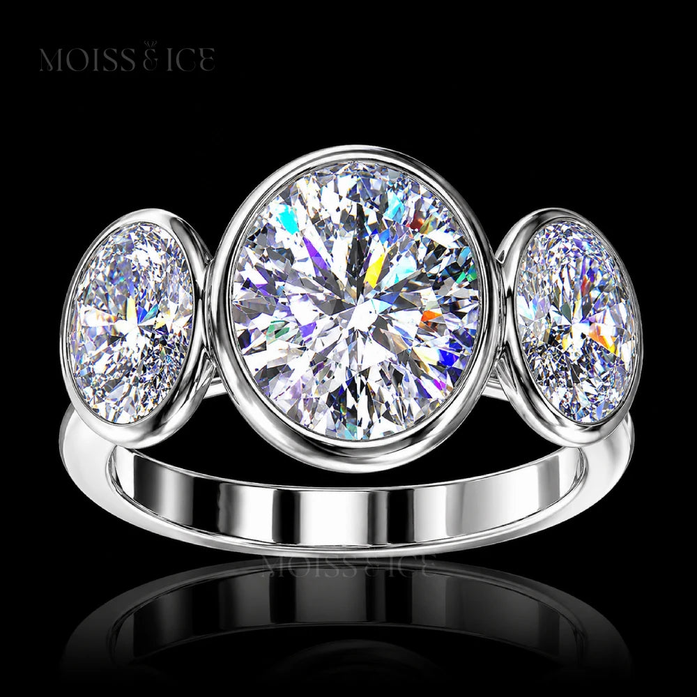 White Gold Oval 3 Stone Trilogy Moissanite Engagement Ring called the KAHANI by Moiss & Ice Canada
