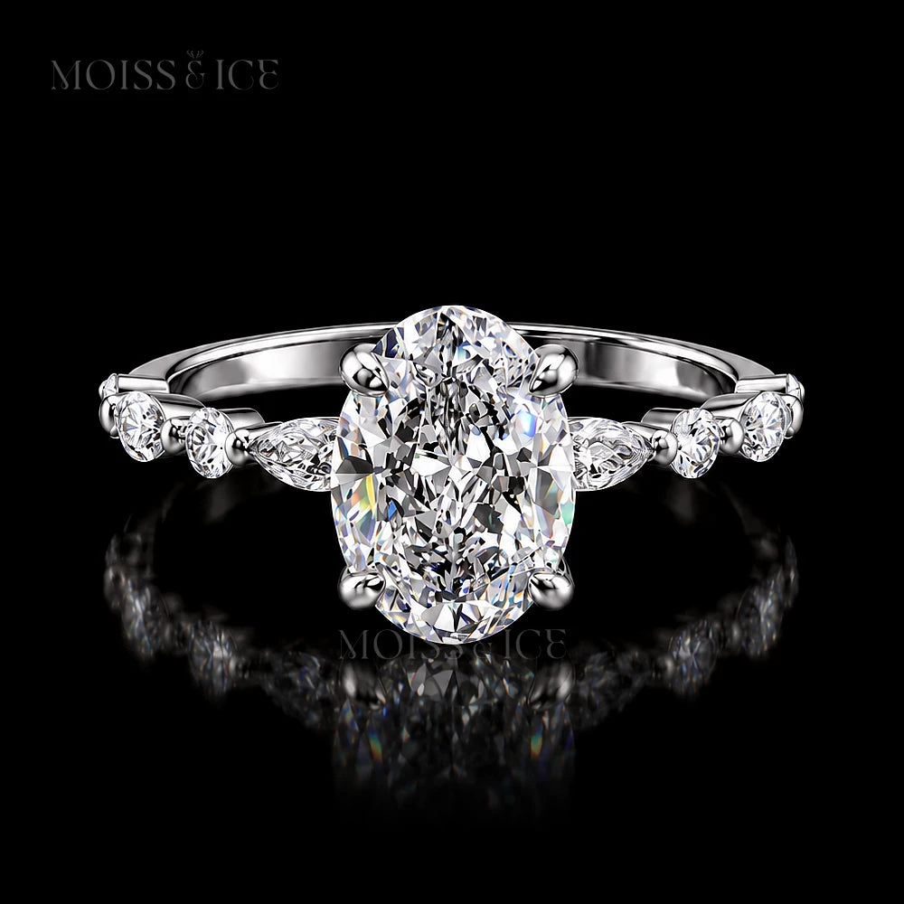 The Aishani oval Lab Grown Diamond engagement ring in white gold with marquise and round side stones by Moiss & Ice Canada