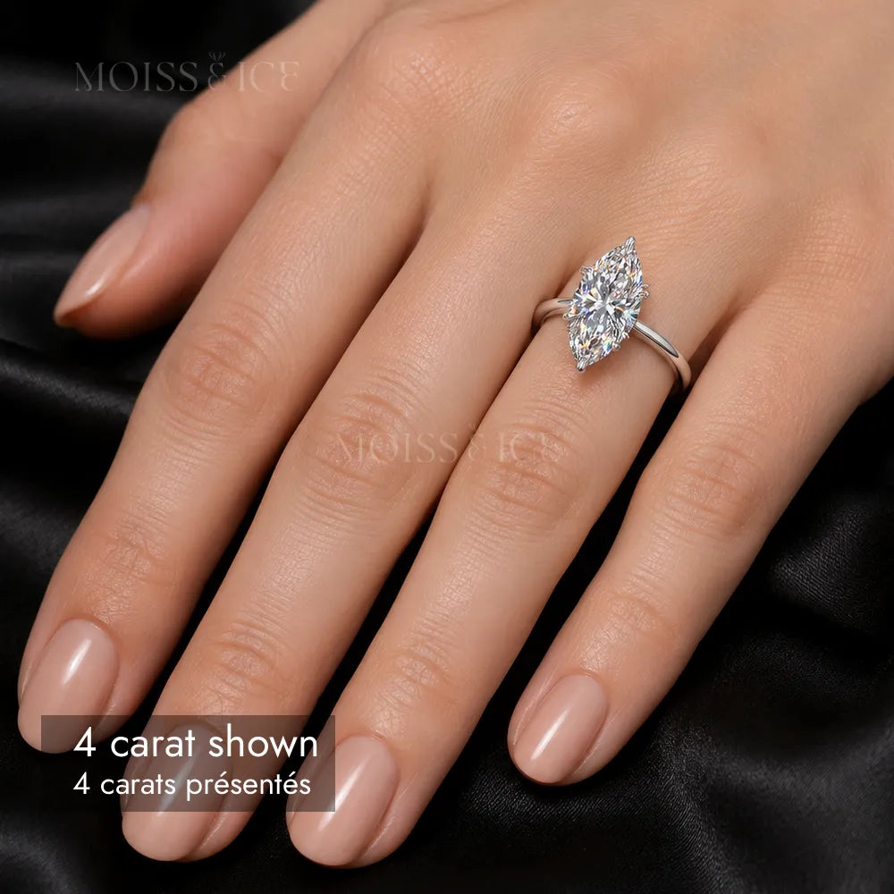 woman wearing 4 carat marquise cut moissanite engagement ring in white gold by Moiss and Ice Canada