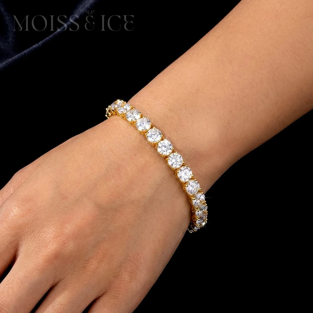 Female wearing Moiss and Ice Canada Tennis Bracelet made in gold with moissanite stones