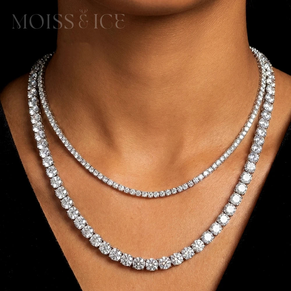 Woman wearing 2 different Moiss and Ice Tennis necklaces in white gold with moissanite stones