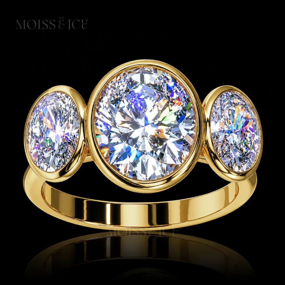 Yellow Gold Oval 3 Stone Trilogy Moissanite Engagement Ring called the KAHANI by Moiss & Ice Canada