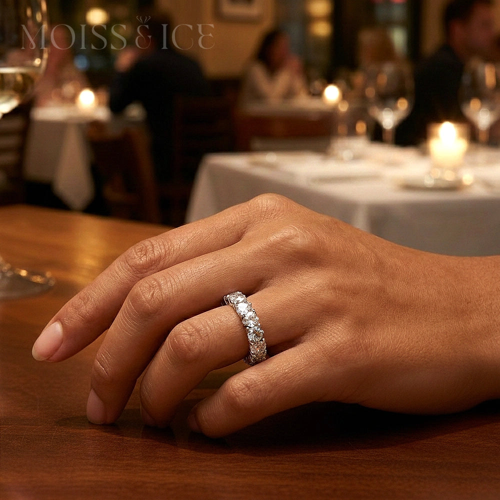 close up of a female hand wearing round cut eternity moissanite ring from Moiss and Ice Canada - model the Pyaar