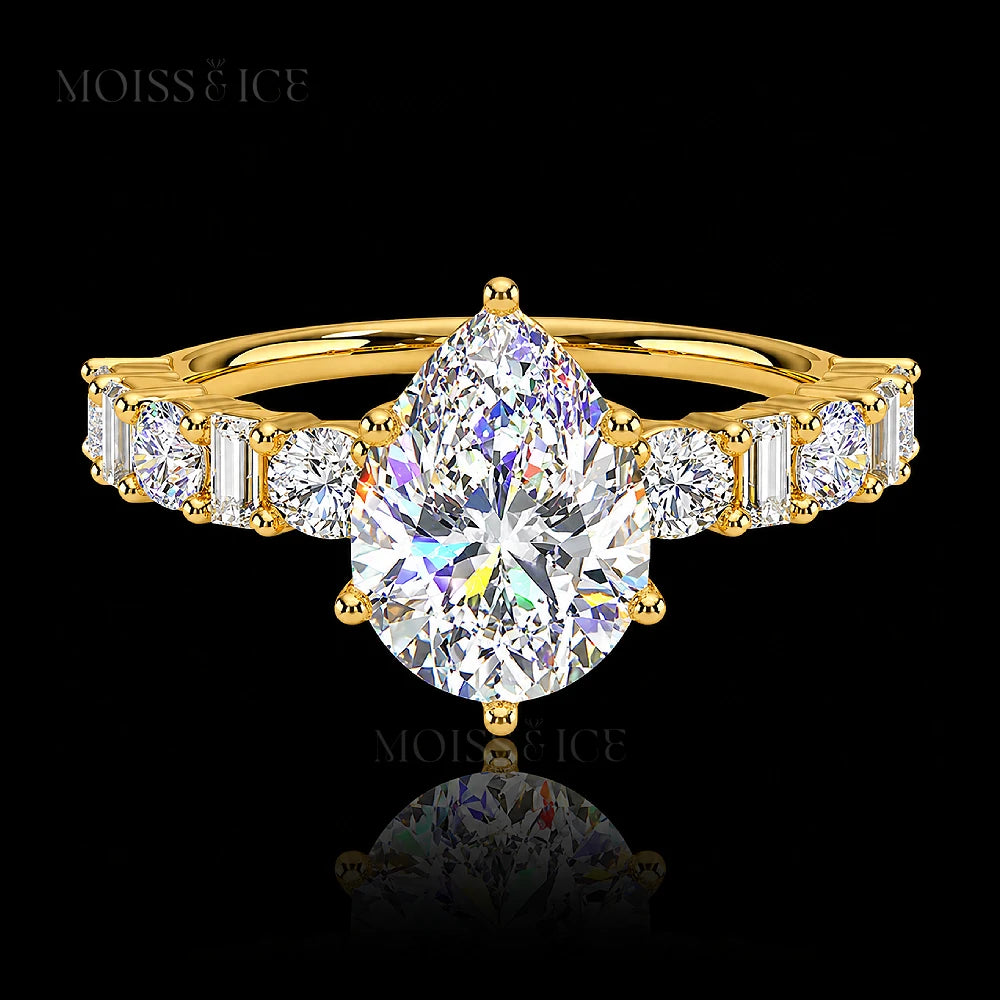 pear cut moissanite engagement ring with a pavé band of alternating baguette and round cut moissanite  stones in 14k and 18k gold - The Chahat by Moiss and Ice Canada