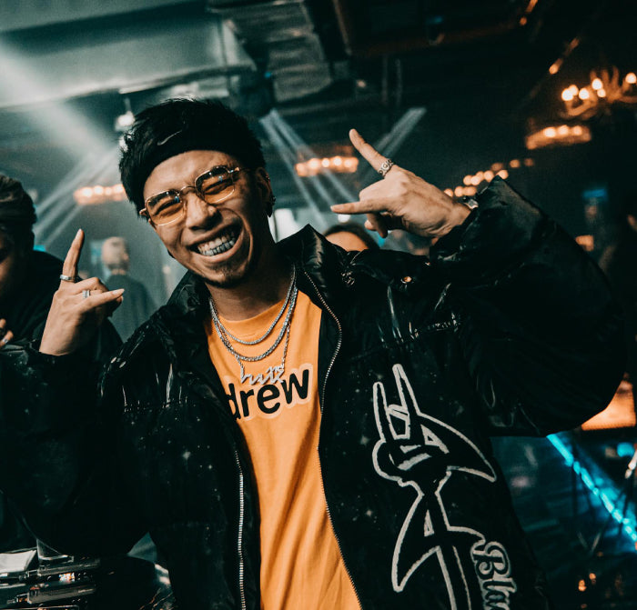 Hip Hop artist wearing white gold moissanite tennis chains