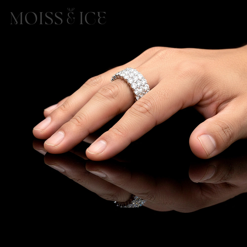 male hand wearing moiss and ice moissanite ring - iced out hip hop jewelry