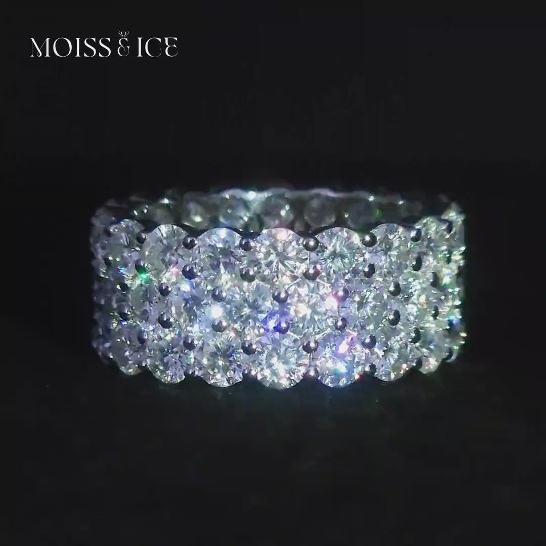 Close up moissanite diamond ring rotating showing sparkling stones
