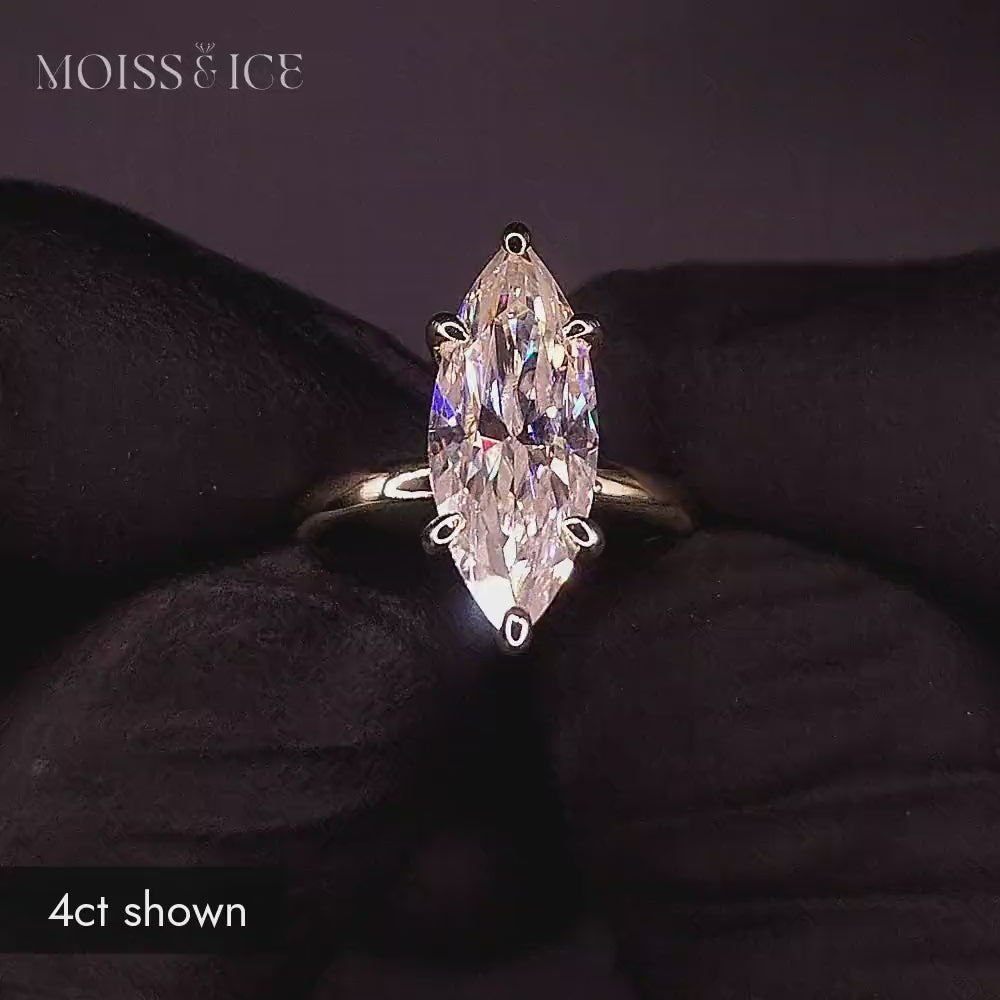 Close up on a 4 carat Lab-Grown Diamond Marquise engagement ring in gold
