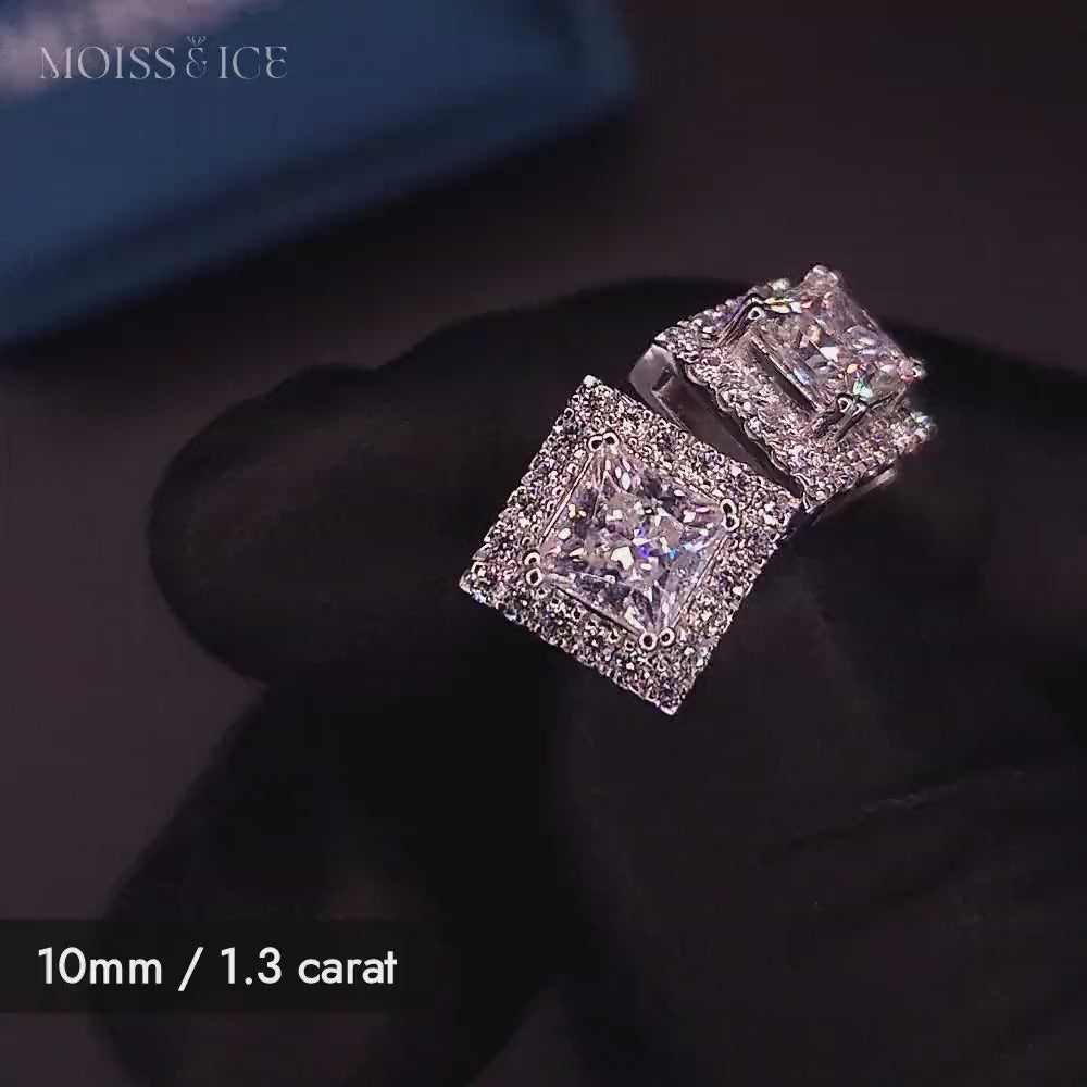 Video showing a close up of a 10mm 1.3 carat princess cut moissanite stud earrings with a moissanite halo ring - by Moiss and Ice Canada