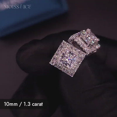 Video showing a close up of a 10mm 1.3 carat princess cut moissanite stud earrings with a moissanite halo ring - by Moiss and Ice Canada