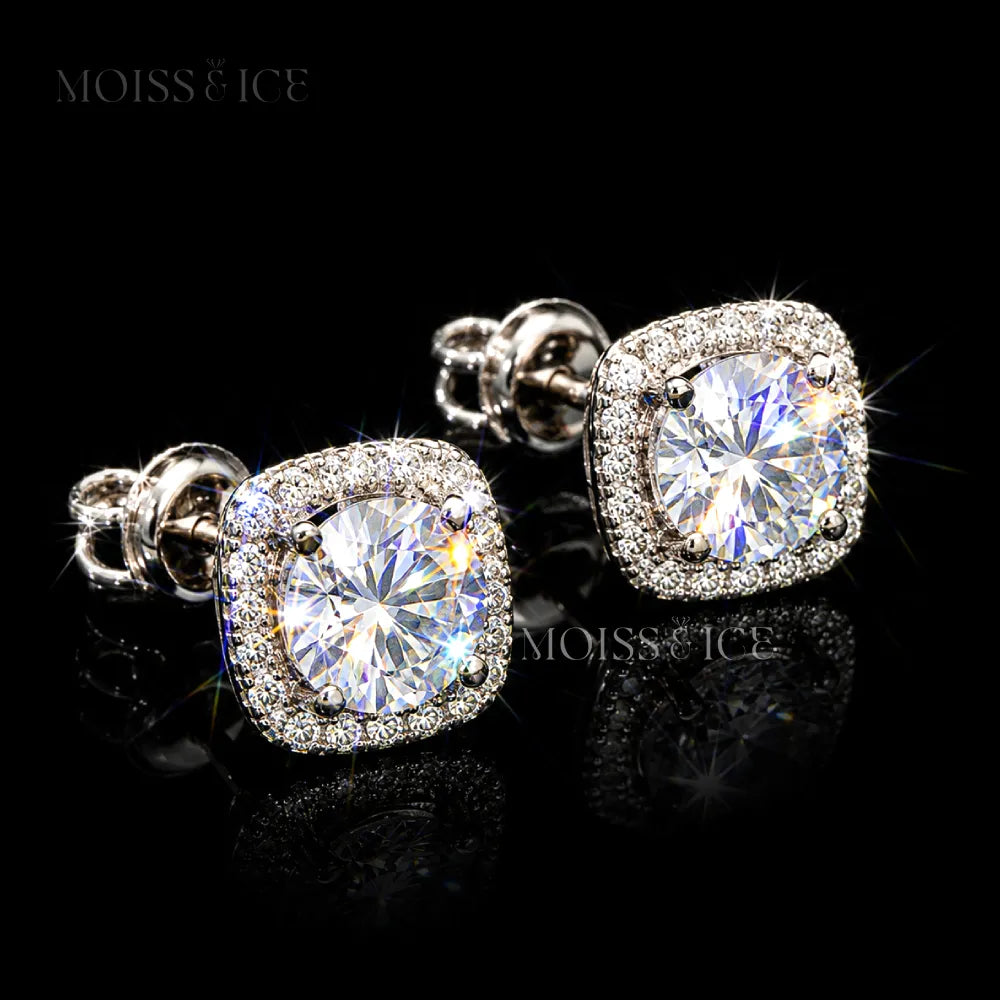 A pair of square cushion-cut stud earrings featuring large moissanite round-cut center stones surrounded by a halo of small clear pavé moissanite stones, set in 925 silver and finished in 18k gold by Moiss and Ice Canada