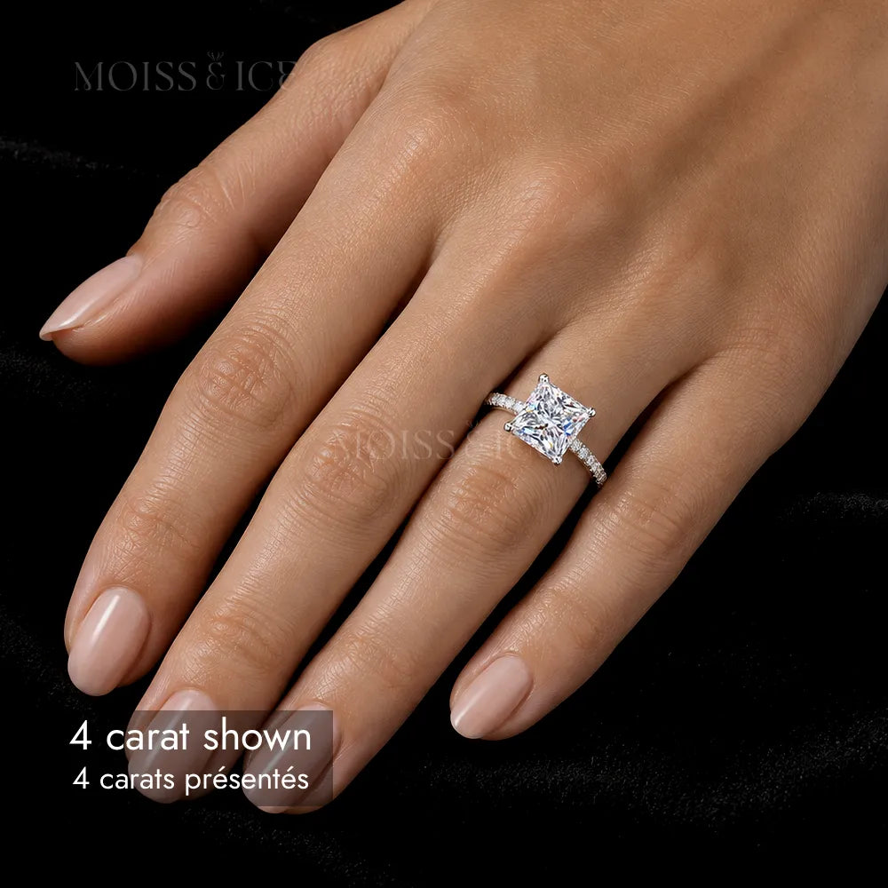 Close up of a woman wearing a 4 carat princess cut moissanite engagement ring with hidden halo and pave band by Moiss and Ice Canada