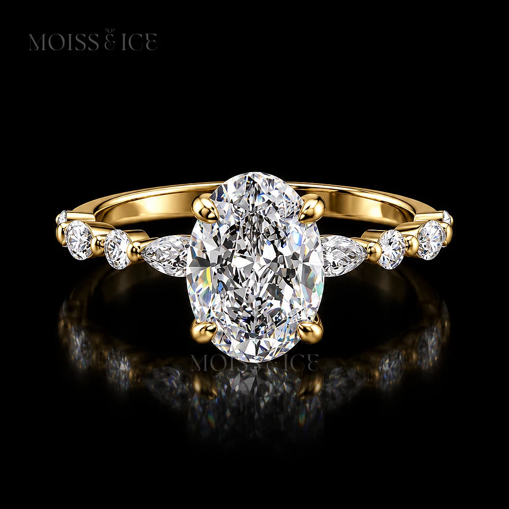The Aishani oval lab-grown diamond engagement ring in yellow gold with marquise and round side stones